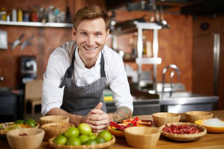 Portrait of Smiling Chef in Kitchen
